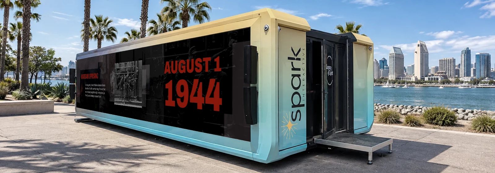 Rendering of the mobile museum trailer on the San Diego waterfront, its exterior LED wall showing August 1, 1944.